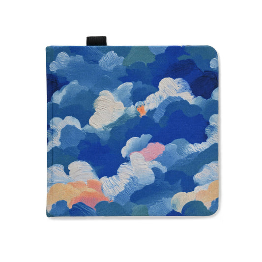 Square watercolor sketchbook with blue cloud-patterned fabric cover